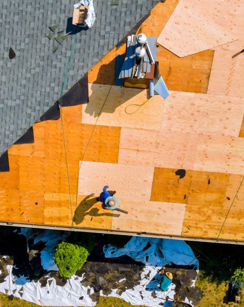 Roof repair by replacing old asphalt bitumen shingles